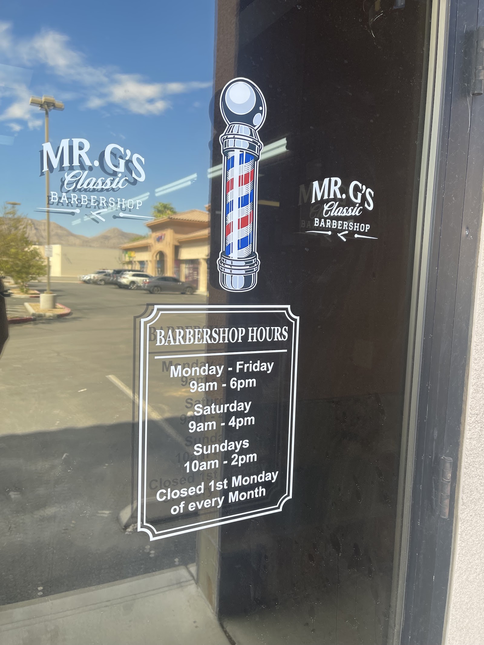 Mr. G's Classic Barbershop window decal with a barber pole and posted hours